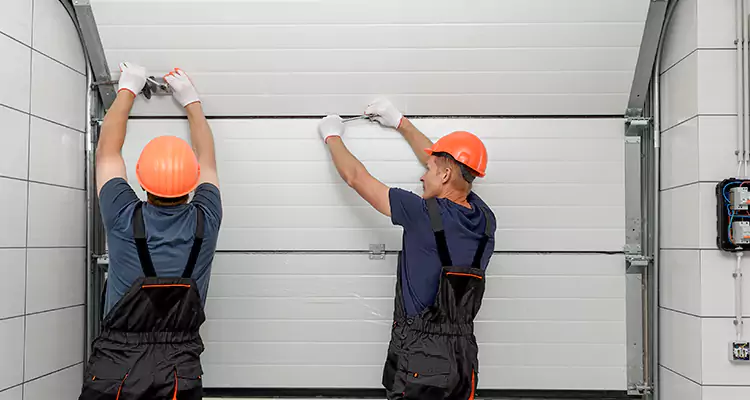 Garage Door Bottom Panel Repair in Pace, FL